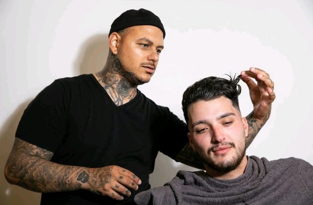 Barber styling client's hair at CHOP CHOP Barbers